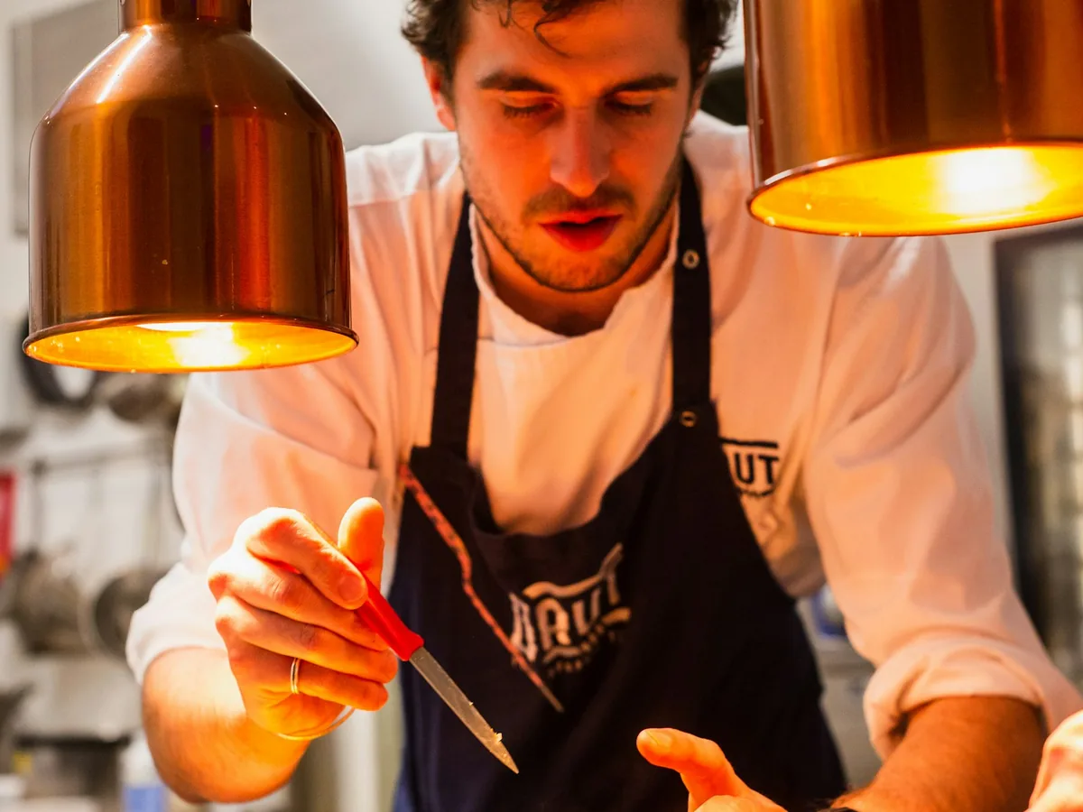 Chef at work in a busy restaurant kitchen